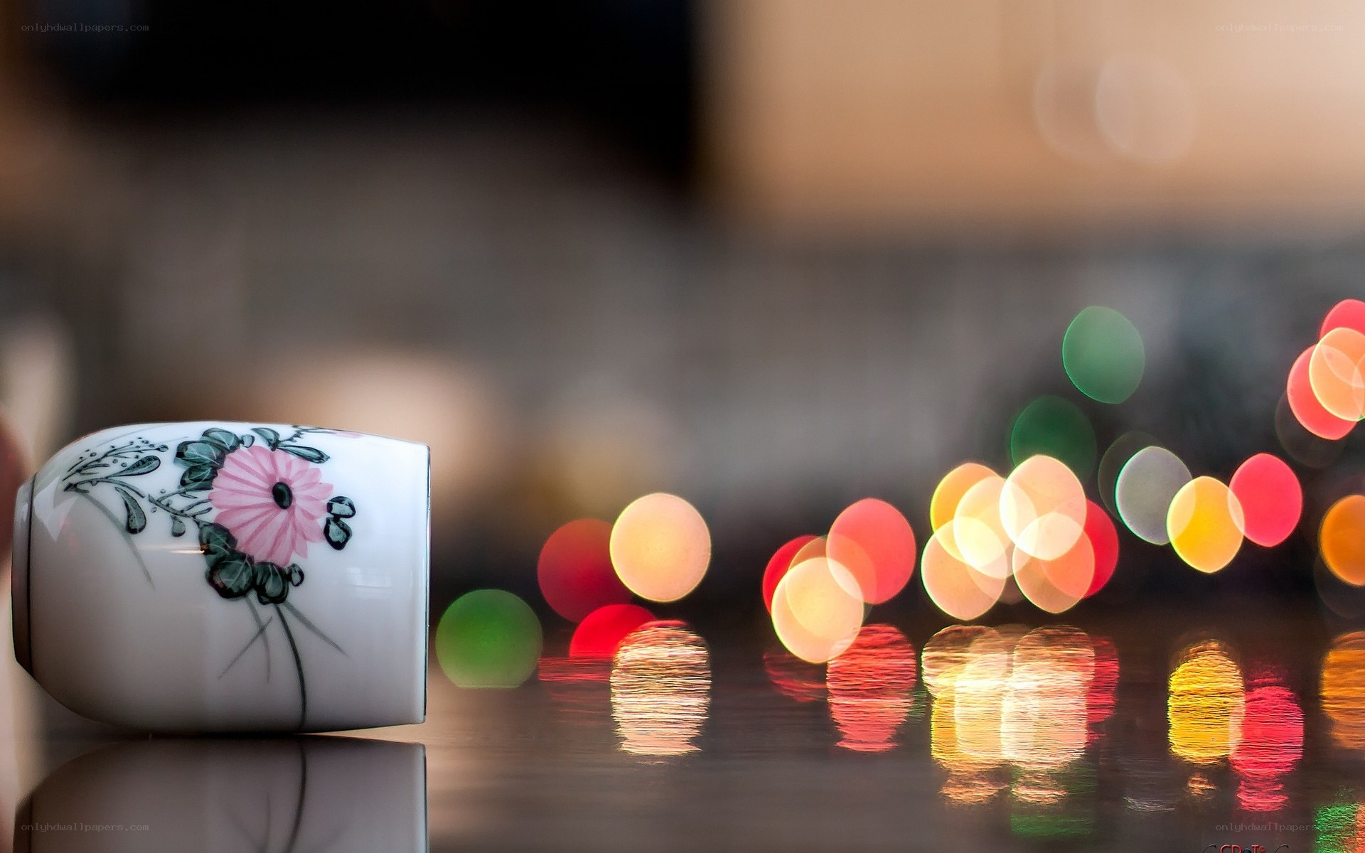 Floral cup with city lights