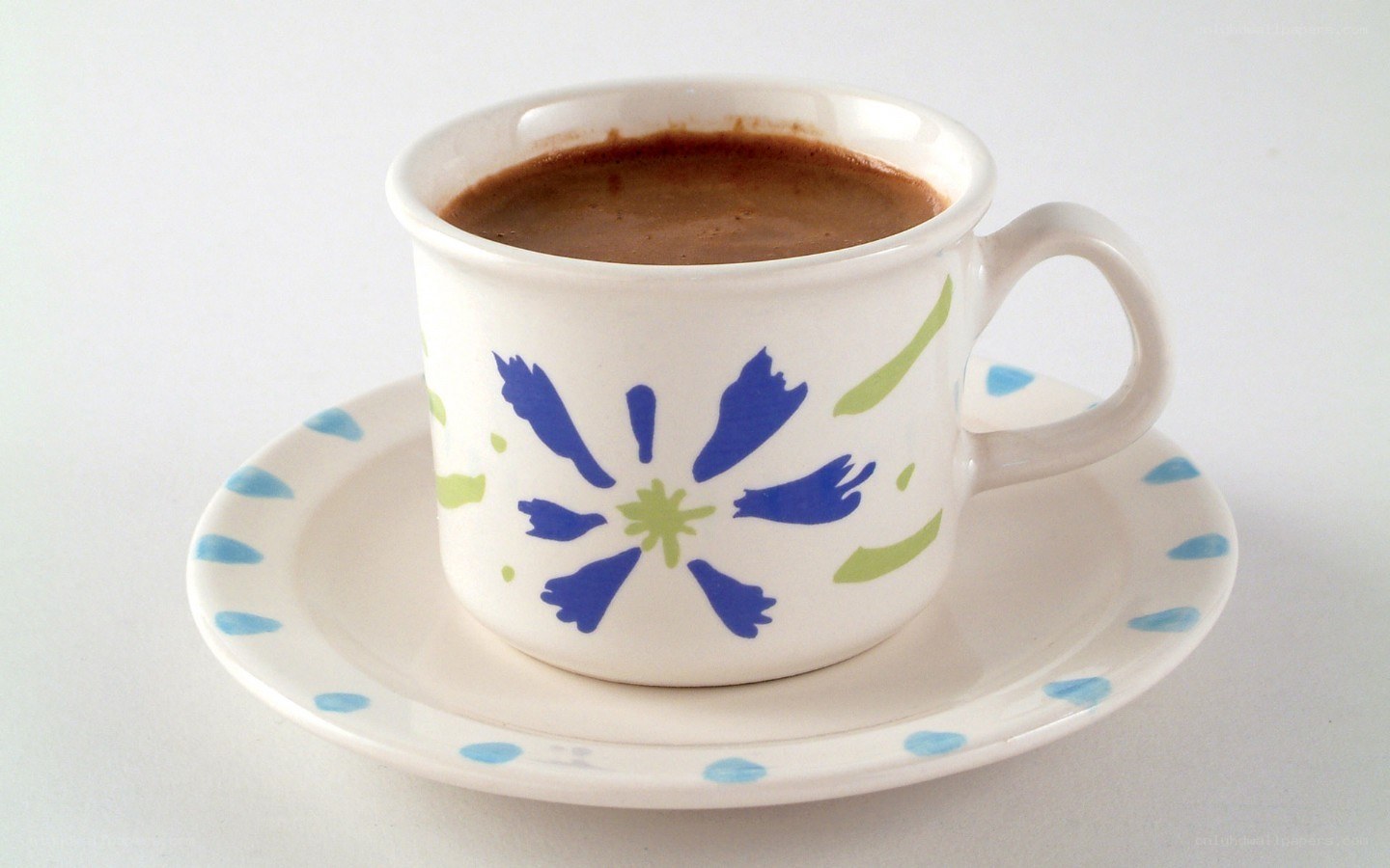Floral cup with coffee