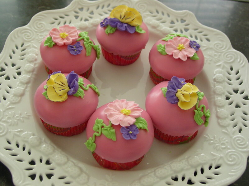 Floral cupcakes on a plate