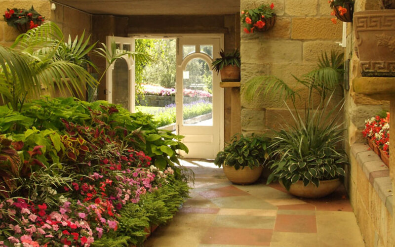 Floral entrance to a stone building