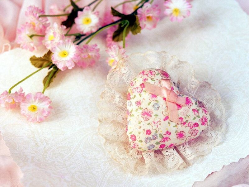 floral heart with lace and flowers