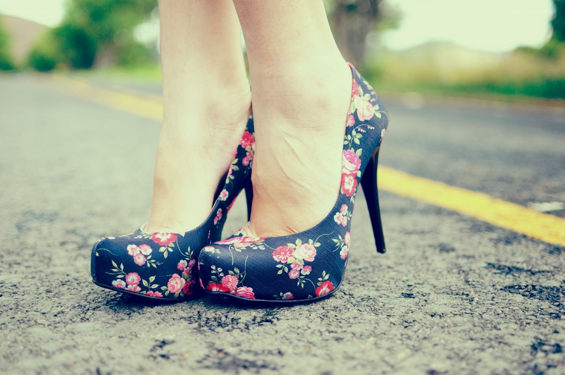 floral high heels on road