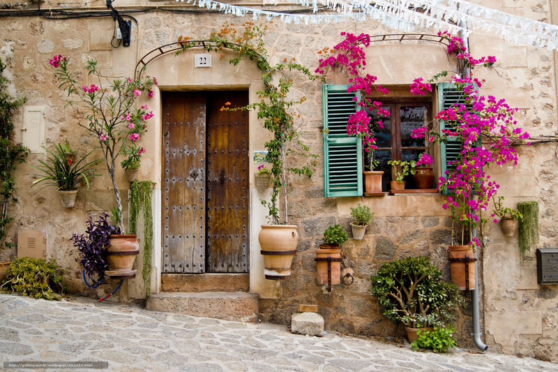Floral house in a stone village
