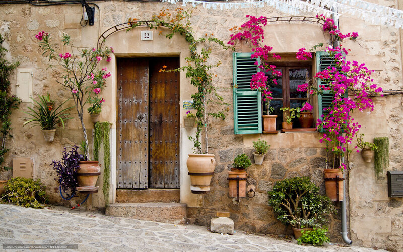 Floral house in a stone village