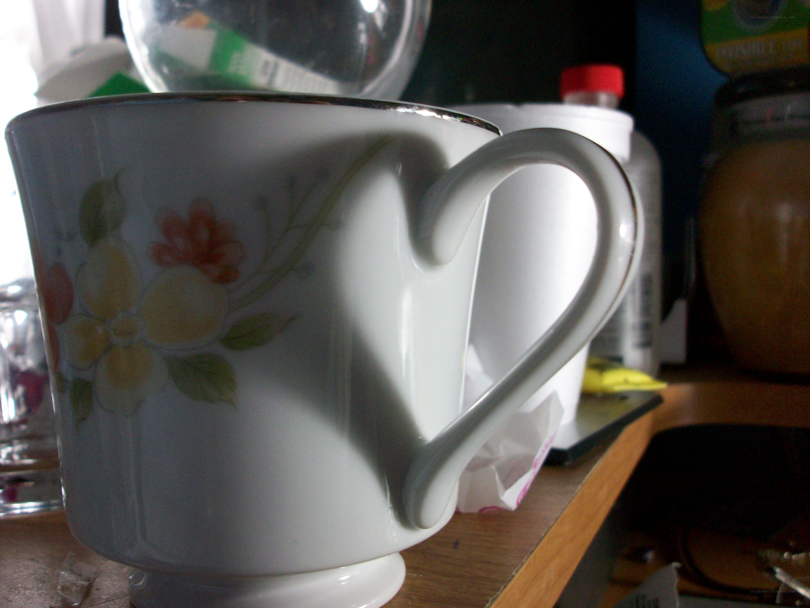 floral mug on a shelf