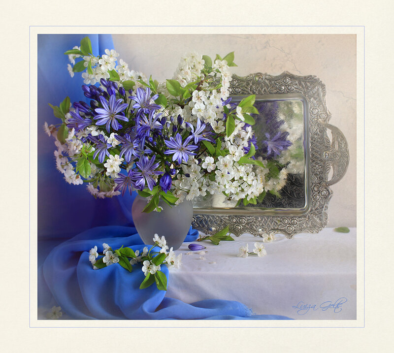 Floral still life with blue cloth