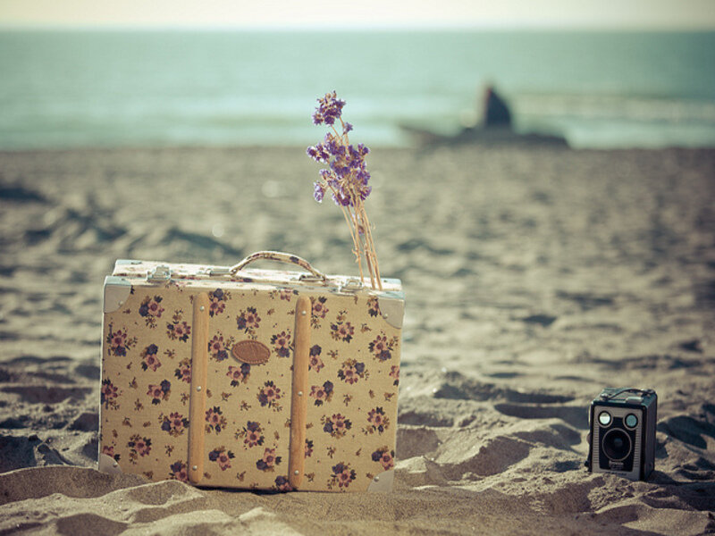Floral Suitcase on Beach