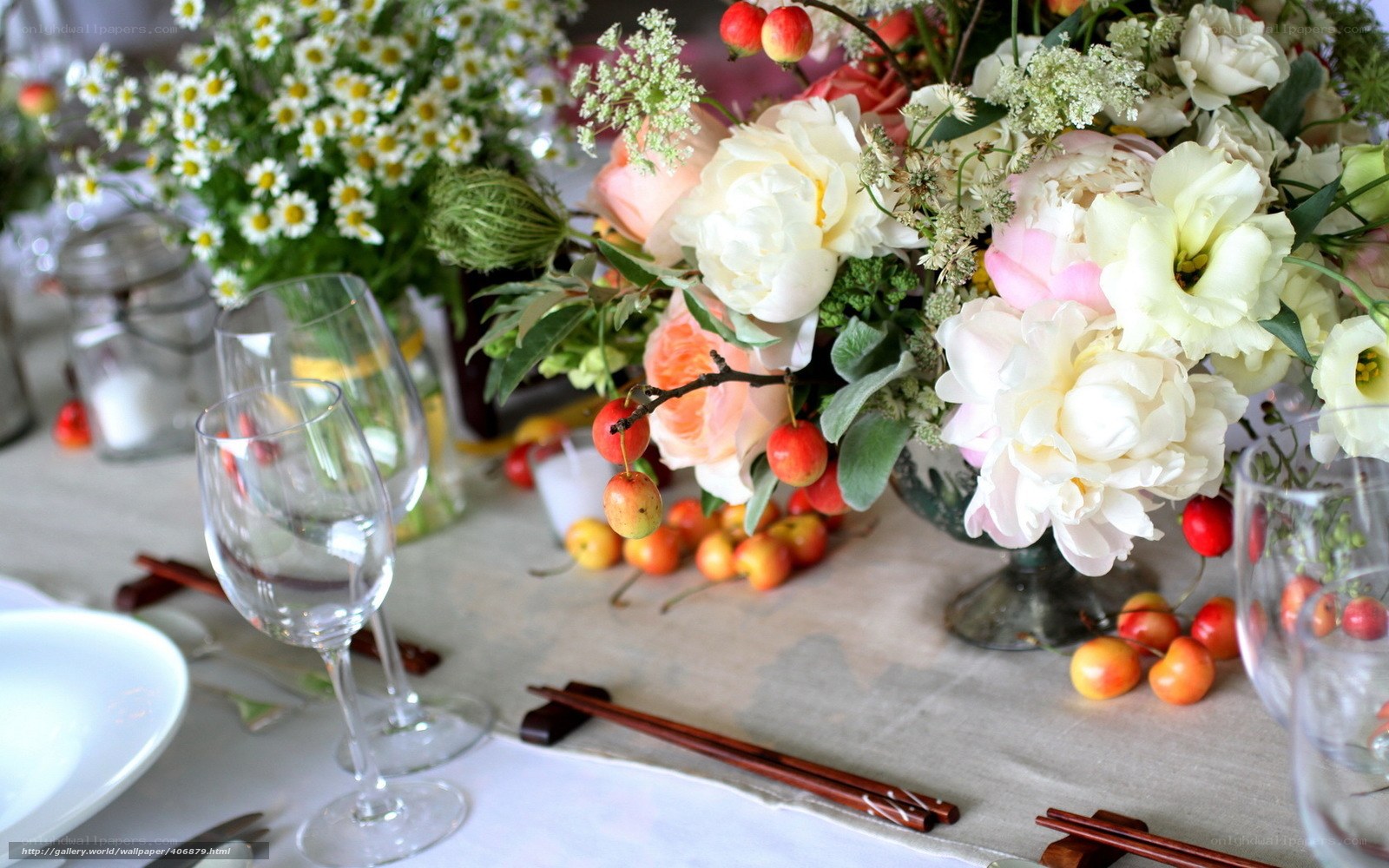 Floral table setting with flowers and fruit