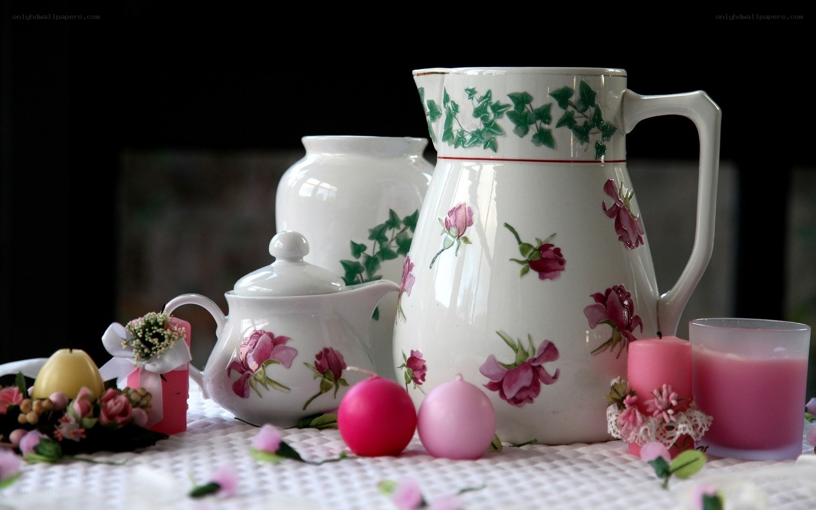 Floral teapot and pitcher arrangement