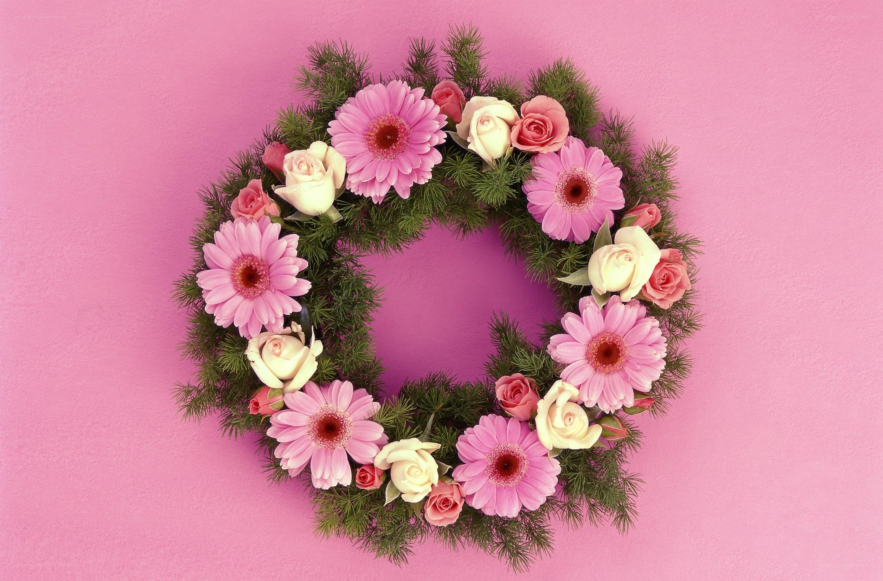 Floral wreath on pink background