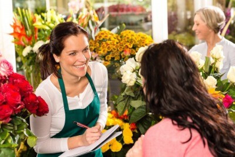 Florist Assisting Customer