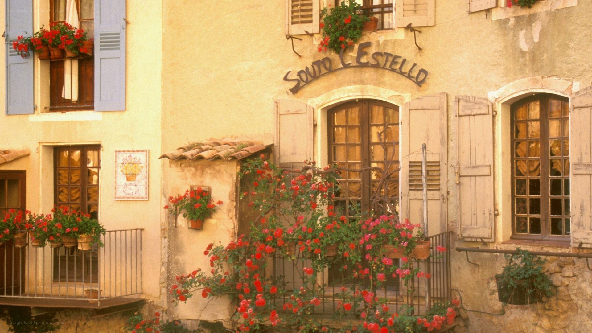 Flower-adorned building in Provence