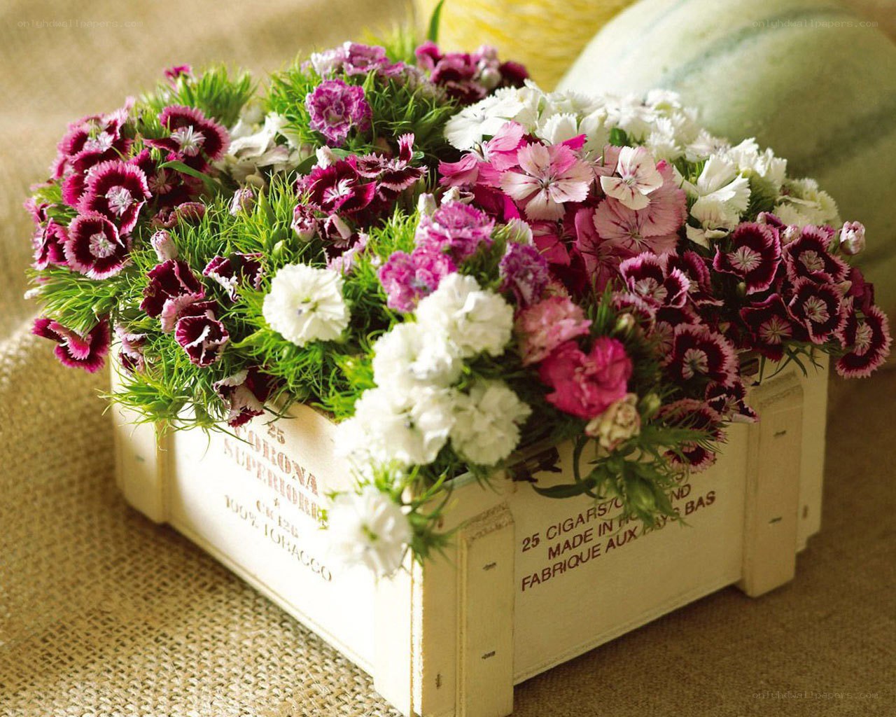 Flower arrangement in a crate