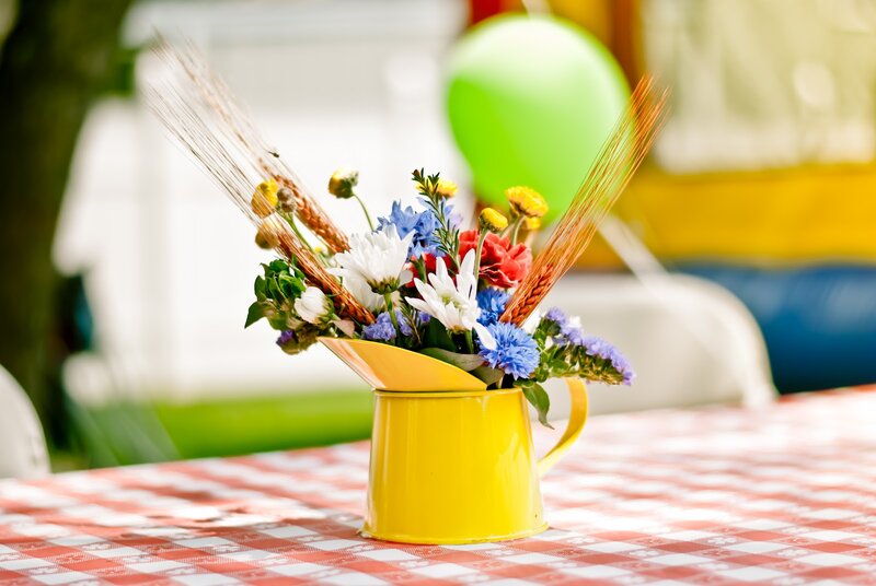 Flower Arrangement in Yellow Pitcher