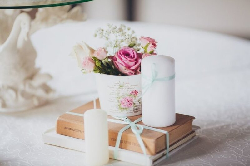Flower Arrangement on Books — White