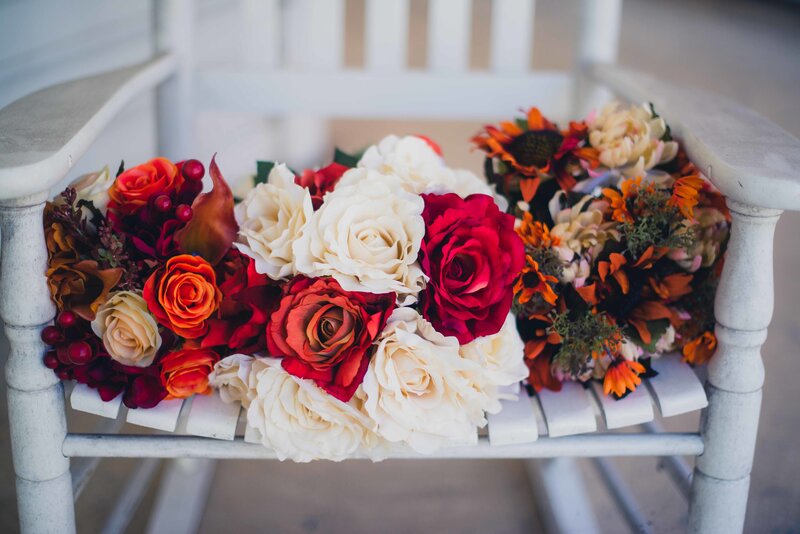 Flower Arrangement on Chair — Red