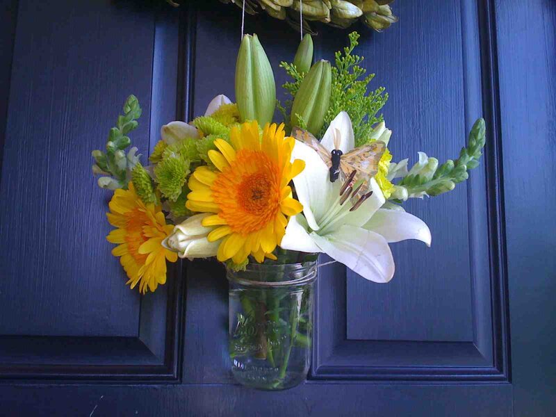 Flower arrangement on door