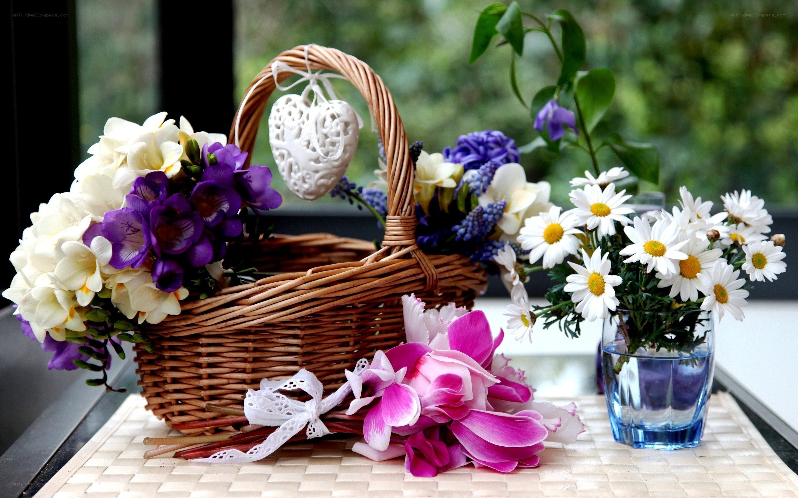 Flower arrangement with basket