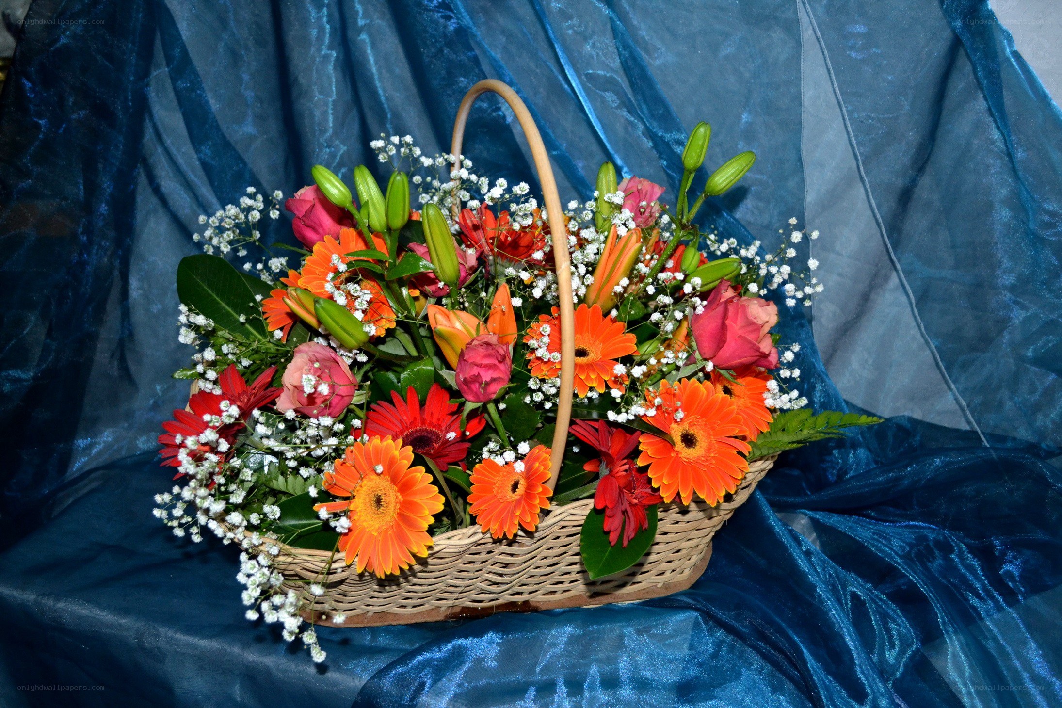 Flower basket on blue cloth