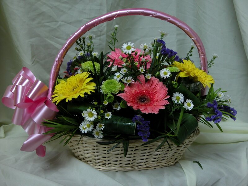Flower basket with pink bow