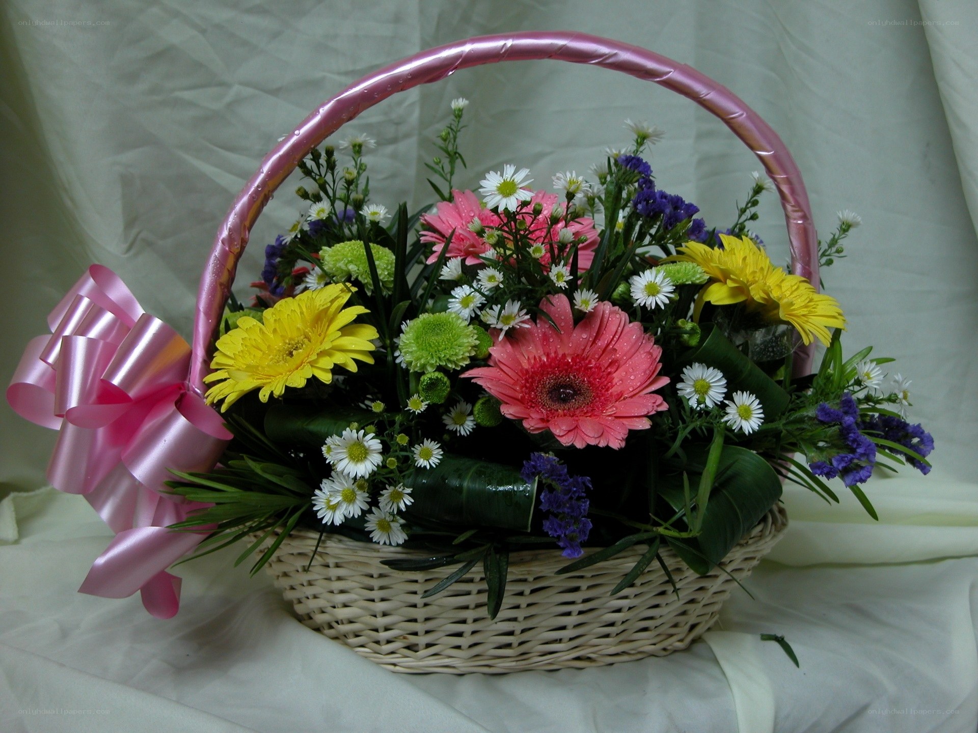 Flower basket with pink bow