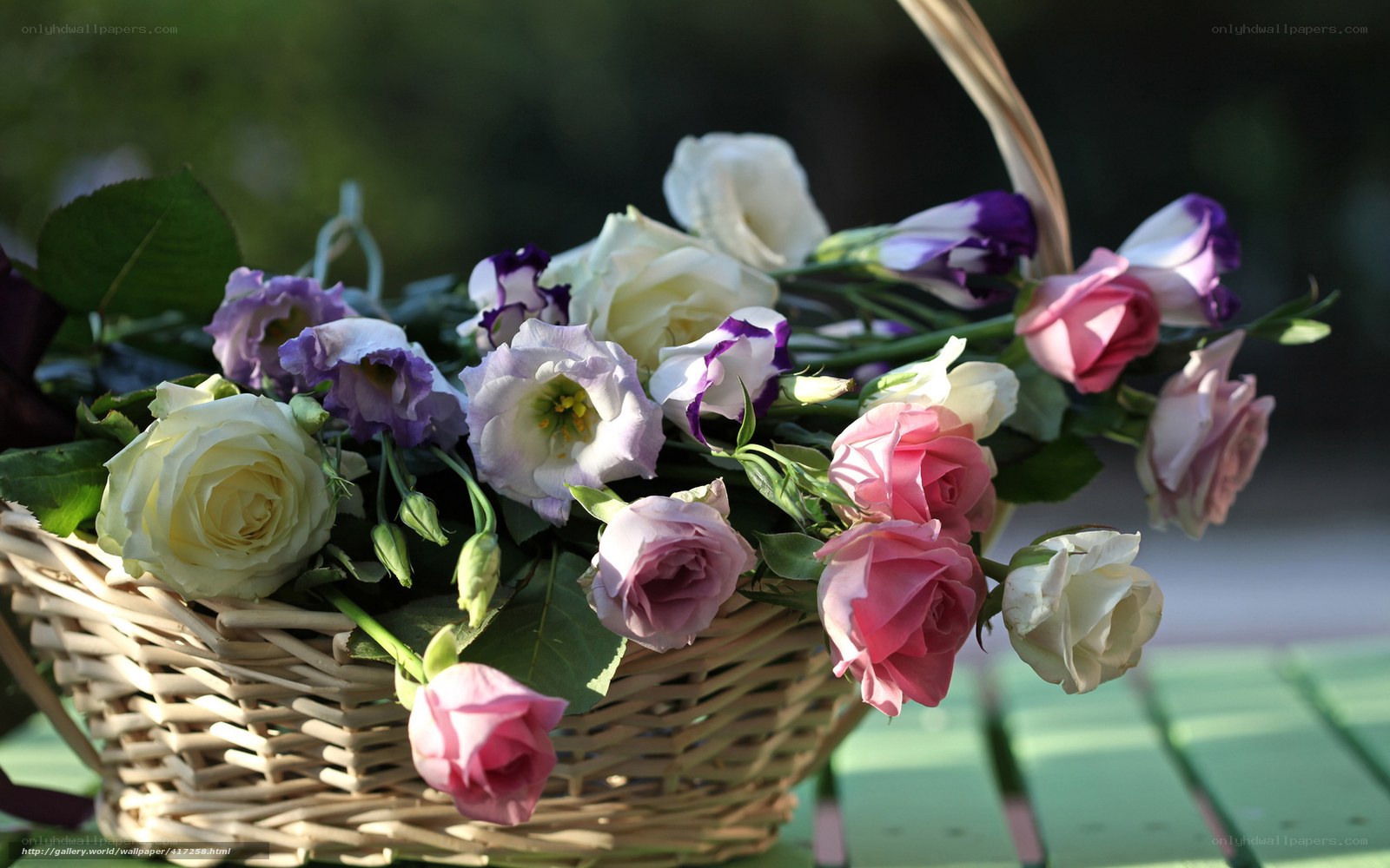 Flower basket with roses and lisianthus