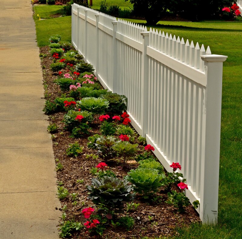 Flower Bed with White Fence