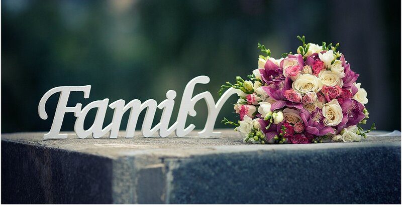 Flower Bouquet and Family Sign