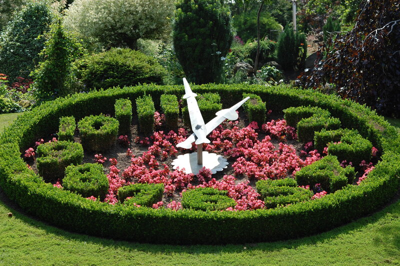 Flower Clock in Garden — Green, Serene, Afternoon