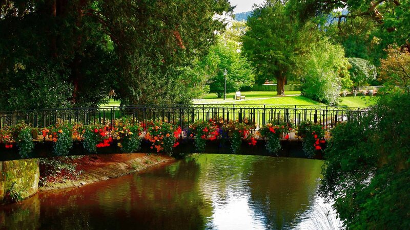 Flower-decked Bridge over River — Green