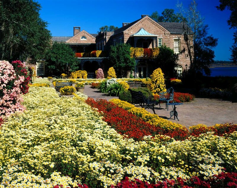 Flower garden at a brick mansion