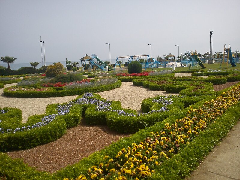 Flower garden near beach playground