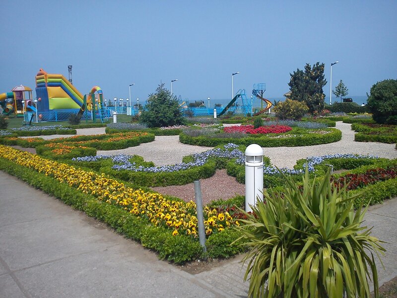Flower garden near beach playground