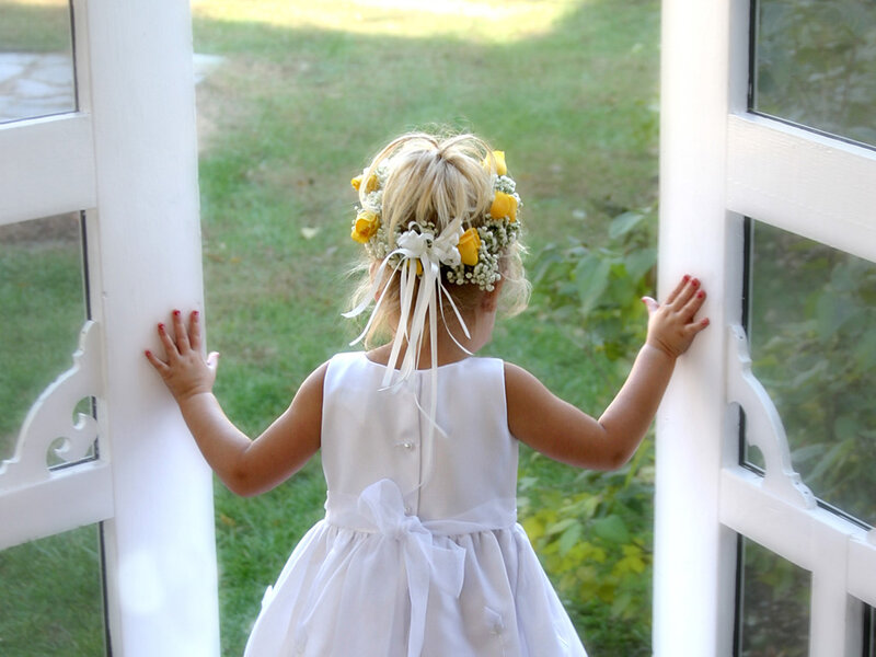 flower girl at doorway