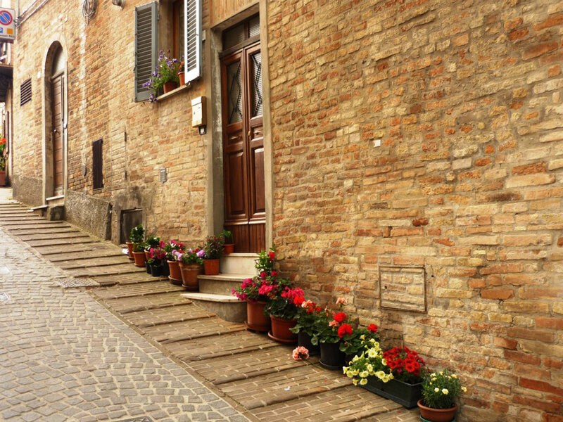Flower-lined alley in an old town