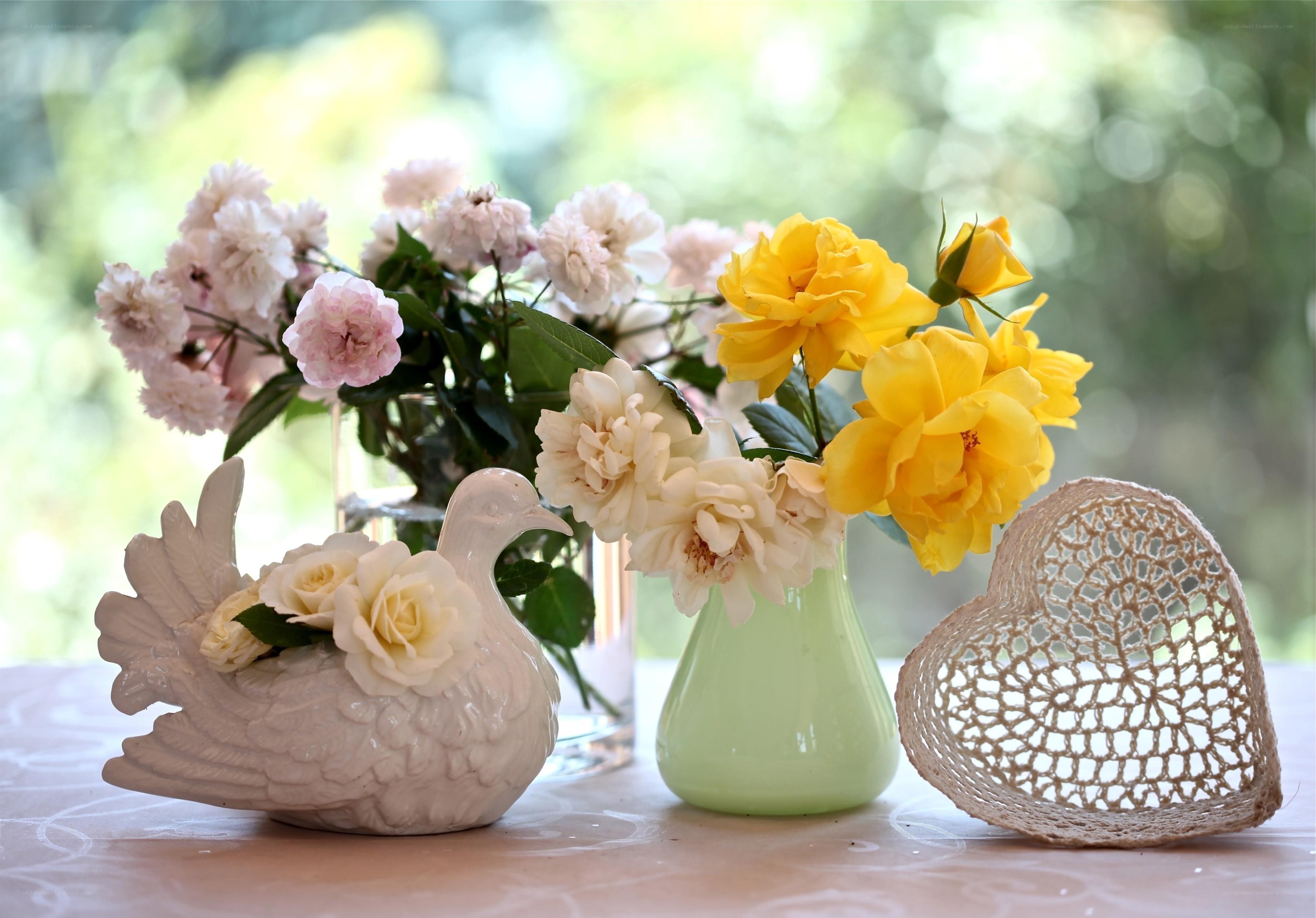 Flowers and a dove sculpture