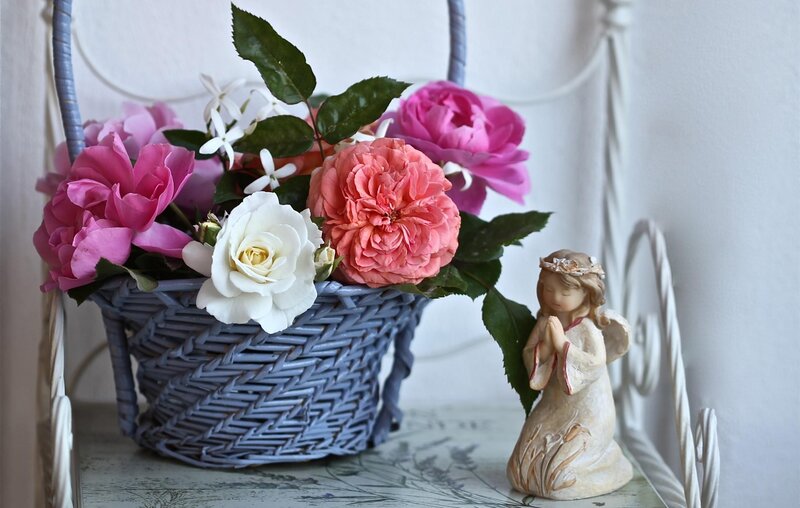 Flowers and angel figurine