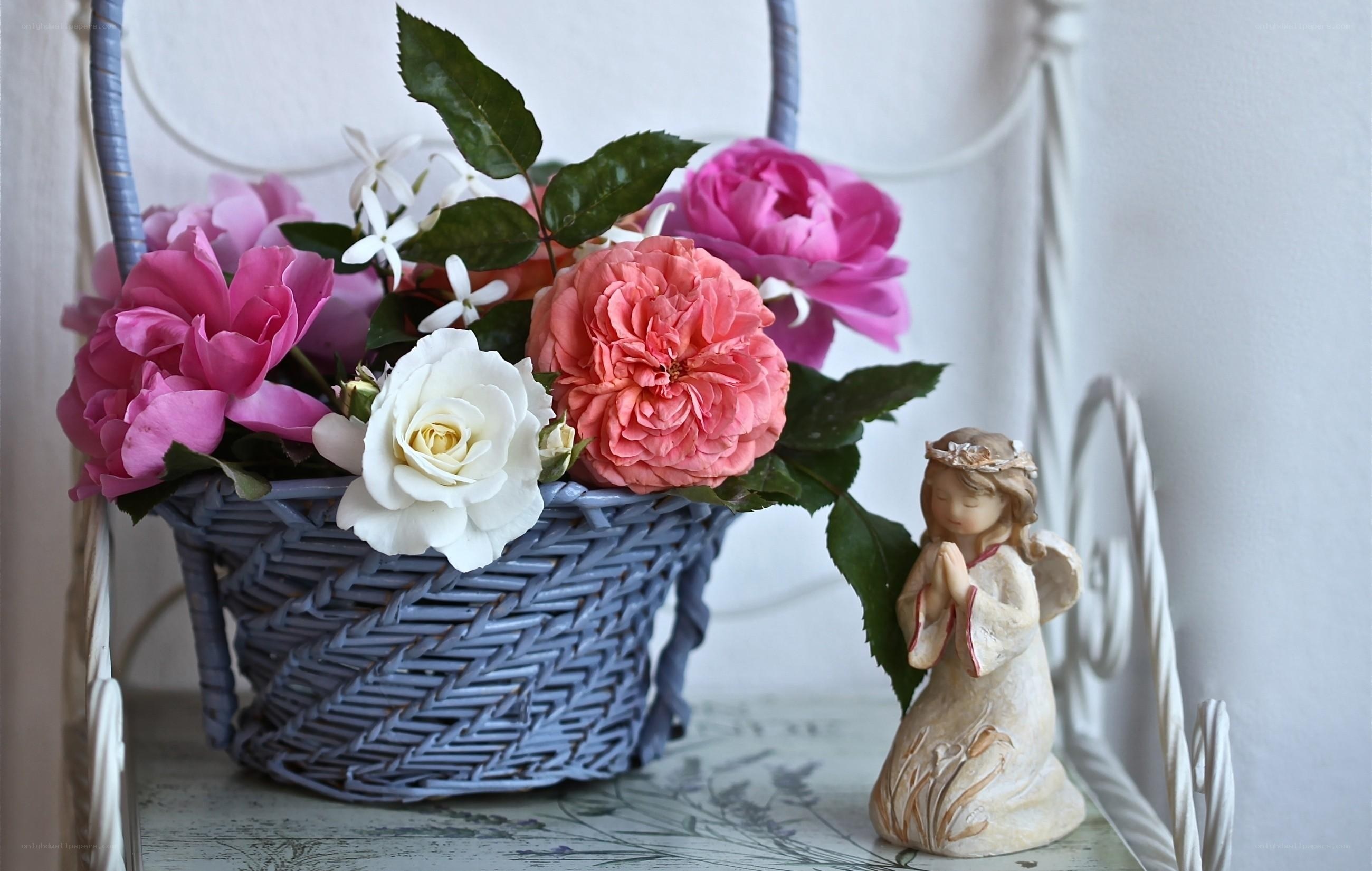 Flowers and angel figurine