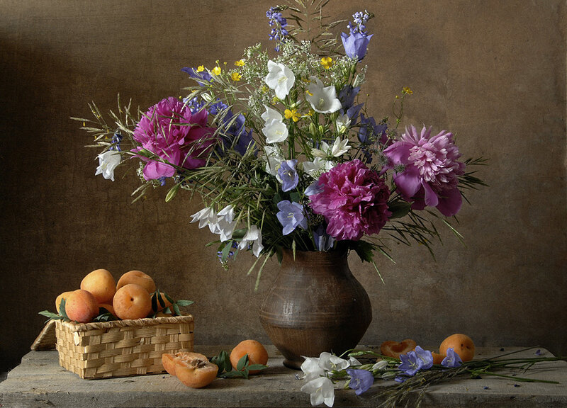 Flowers and apricots still life