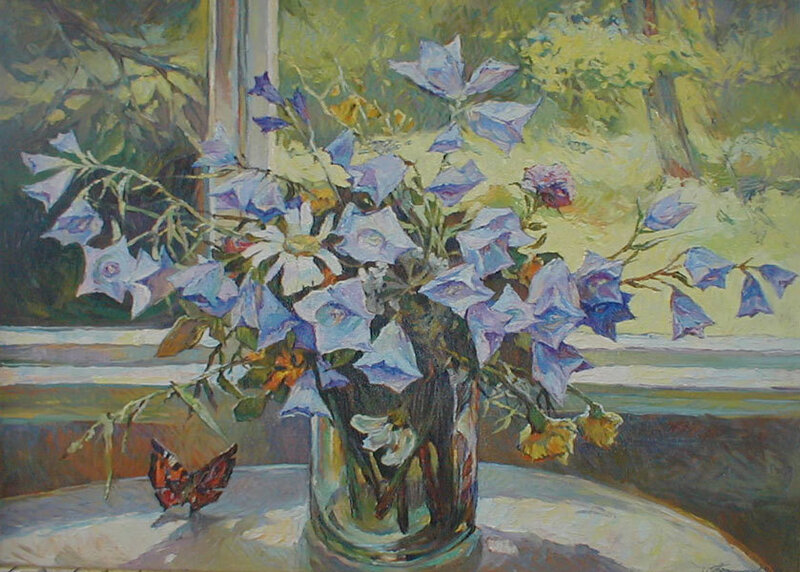 Flowers and butterfly on windowsill