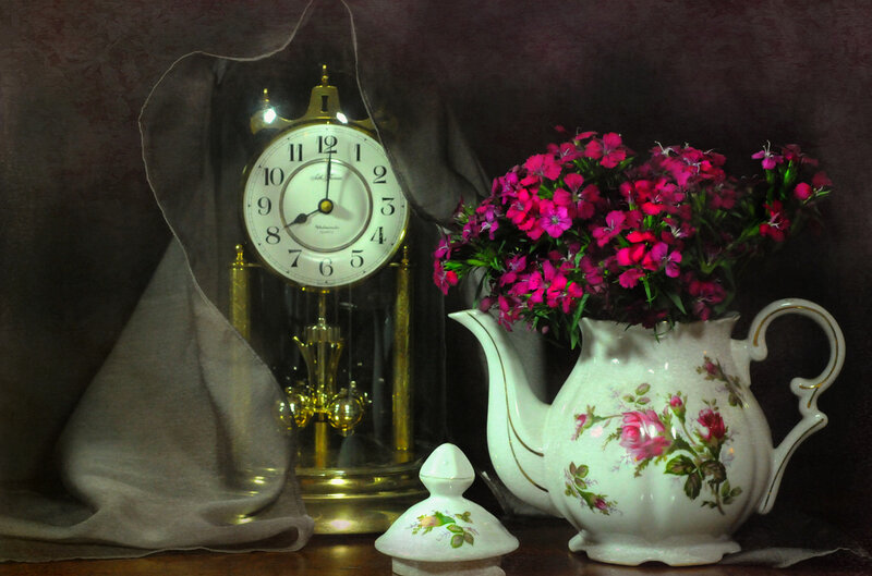 Flowers and clock still life