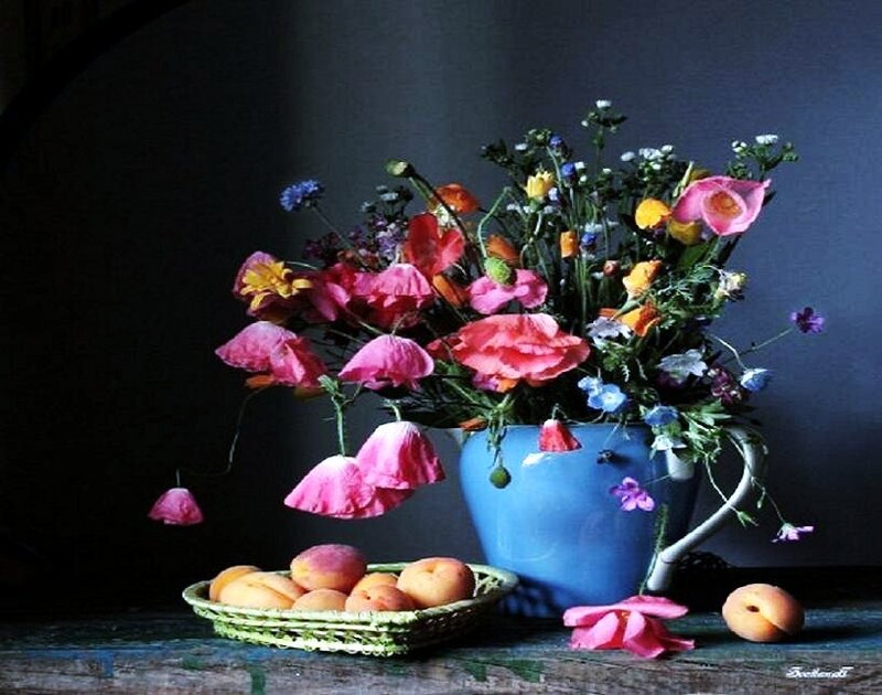 Flowers and fruit on a table