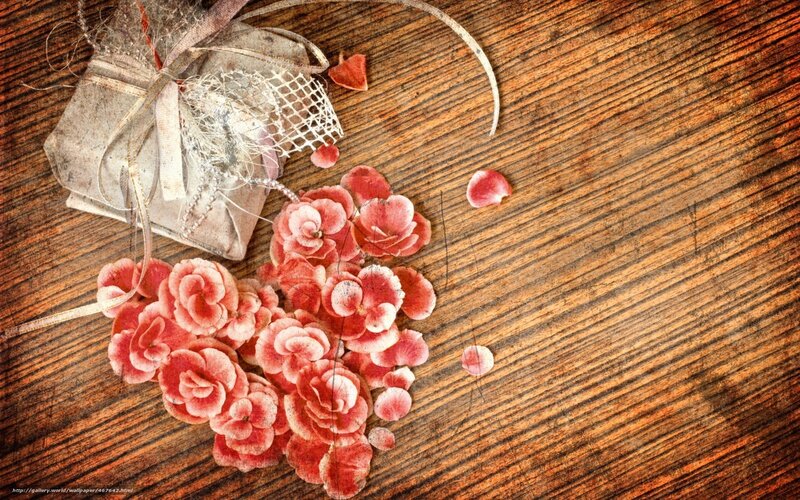 flowers and gift on wood