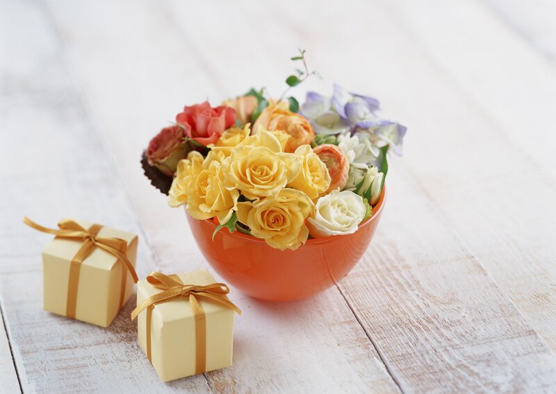 Flowers and gifts on wood