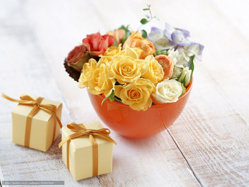 Flowers and gifts on wood