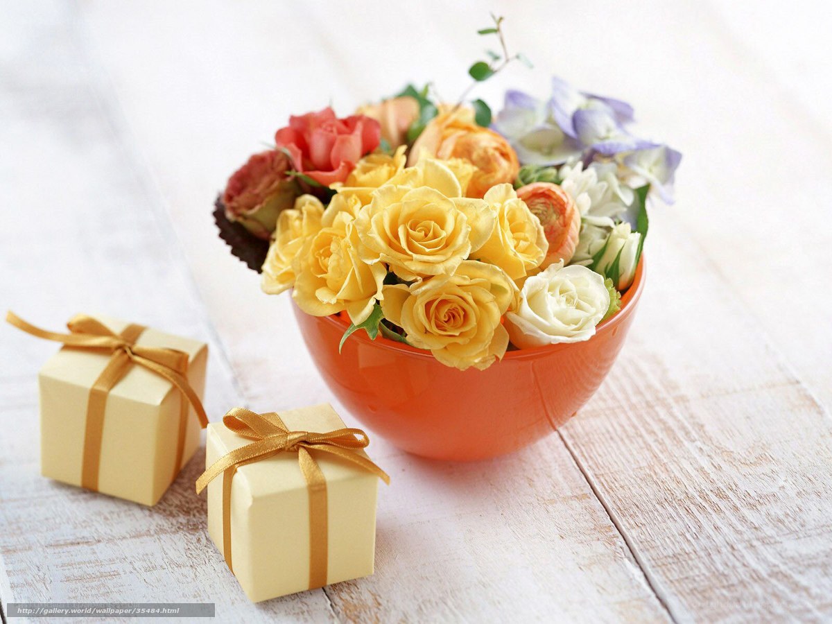 Flowers and gifts on wood