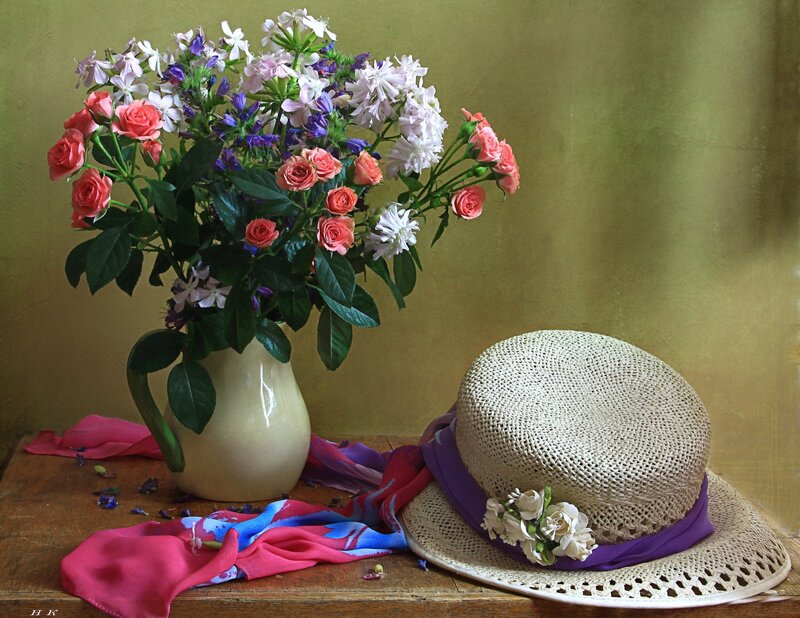 Flowers and Hat on Table