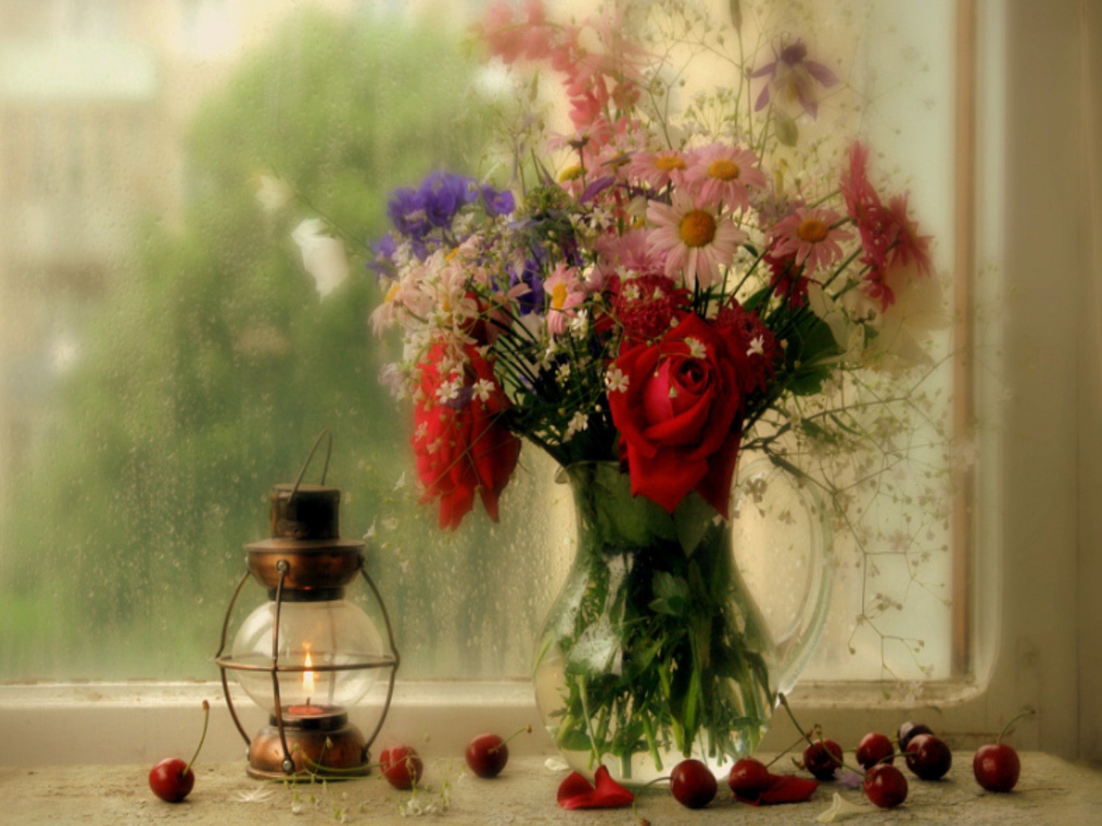 Flowers and lantern by window