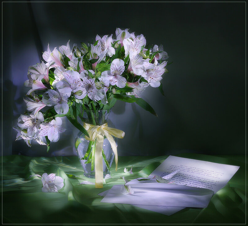 Flowers and letter on green cloth