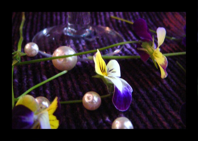 flowers and pearls on purple fabric